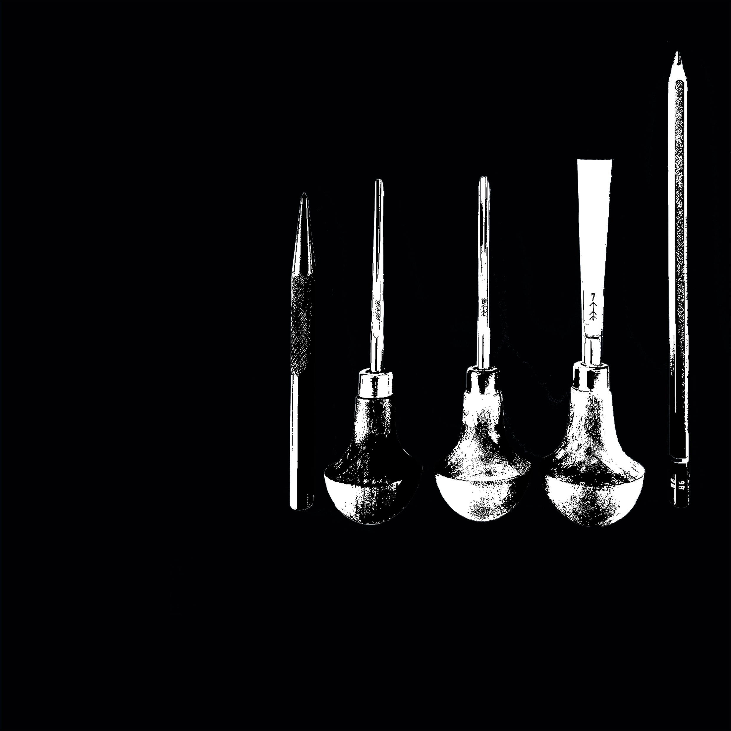 Redskaber til grafisk kunst. Sort-hvid foto